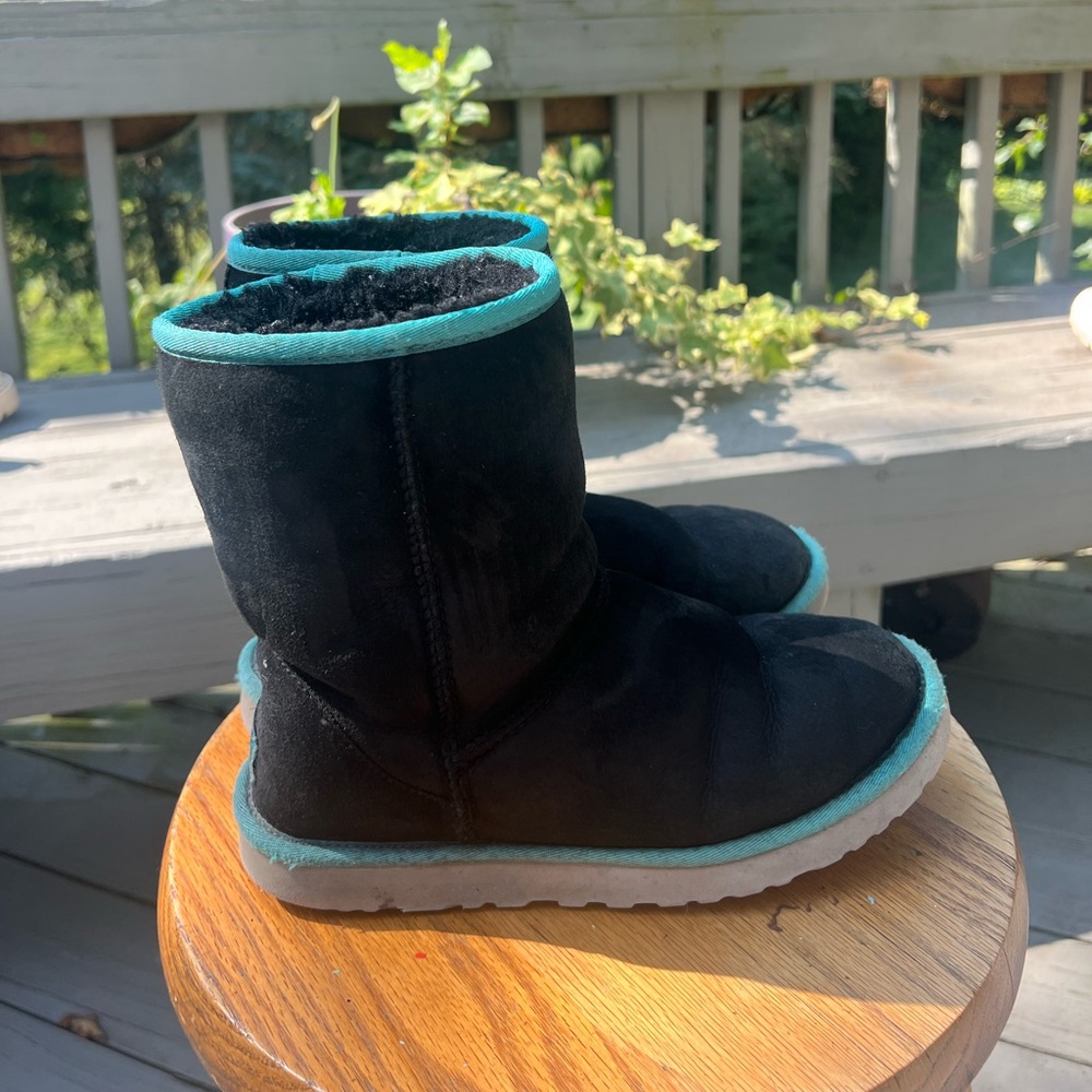 Black and turquoise lined UGG boots